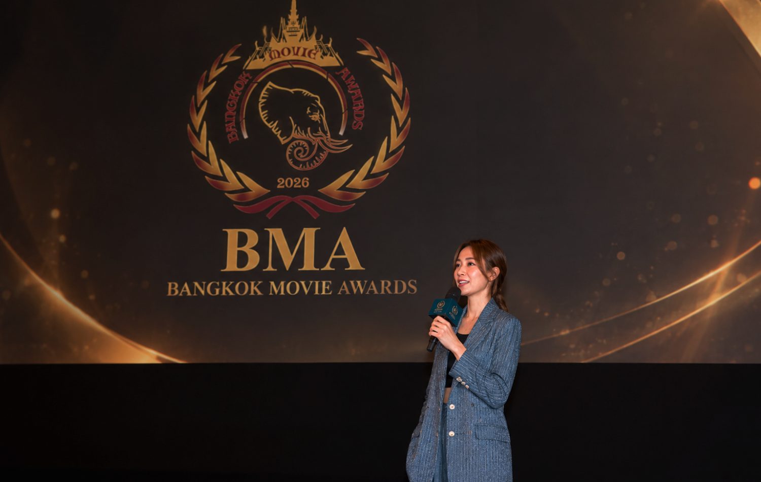 Thai Delegate in Front of the Grand Stage of BMA August 2026 Event.jpg